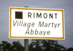 Ortsschild des „Märtyrerdorfs Rimont“